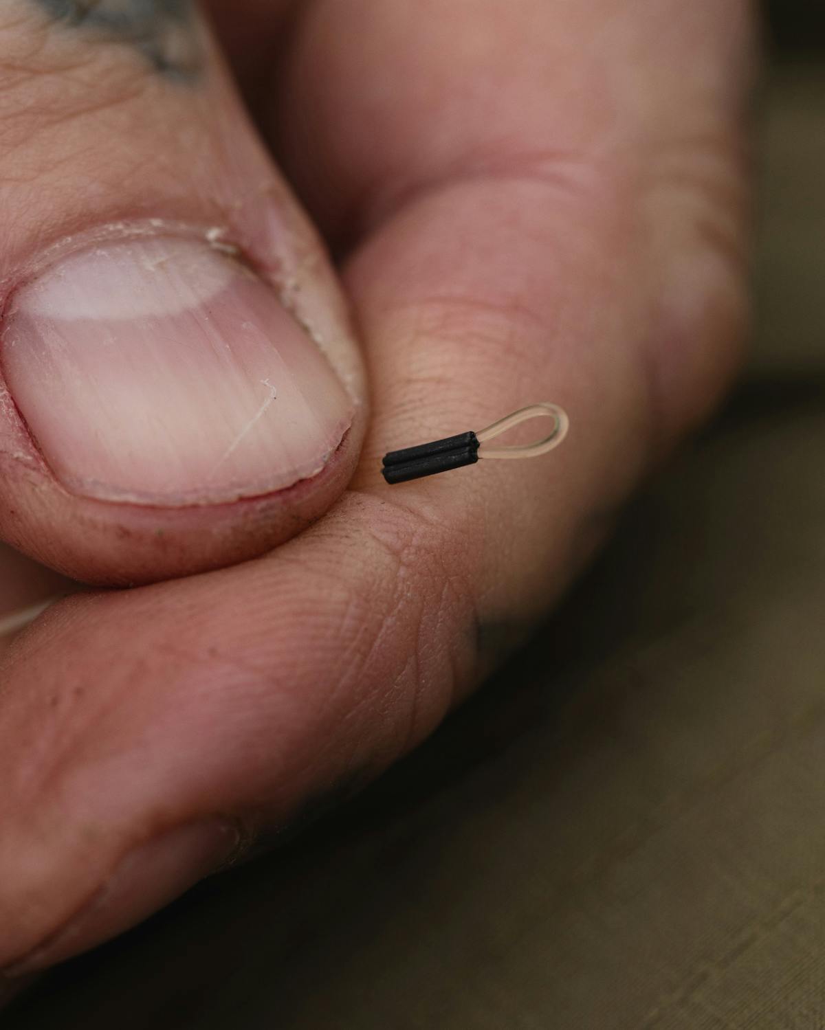 Crimping is a great way of attaching really thick materials and will also suit stiff bristle materials