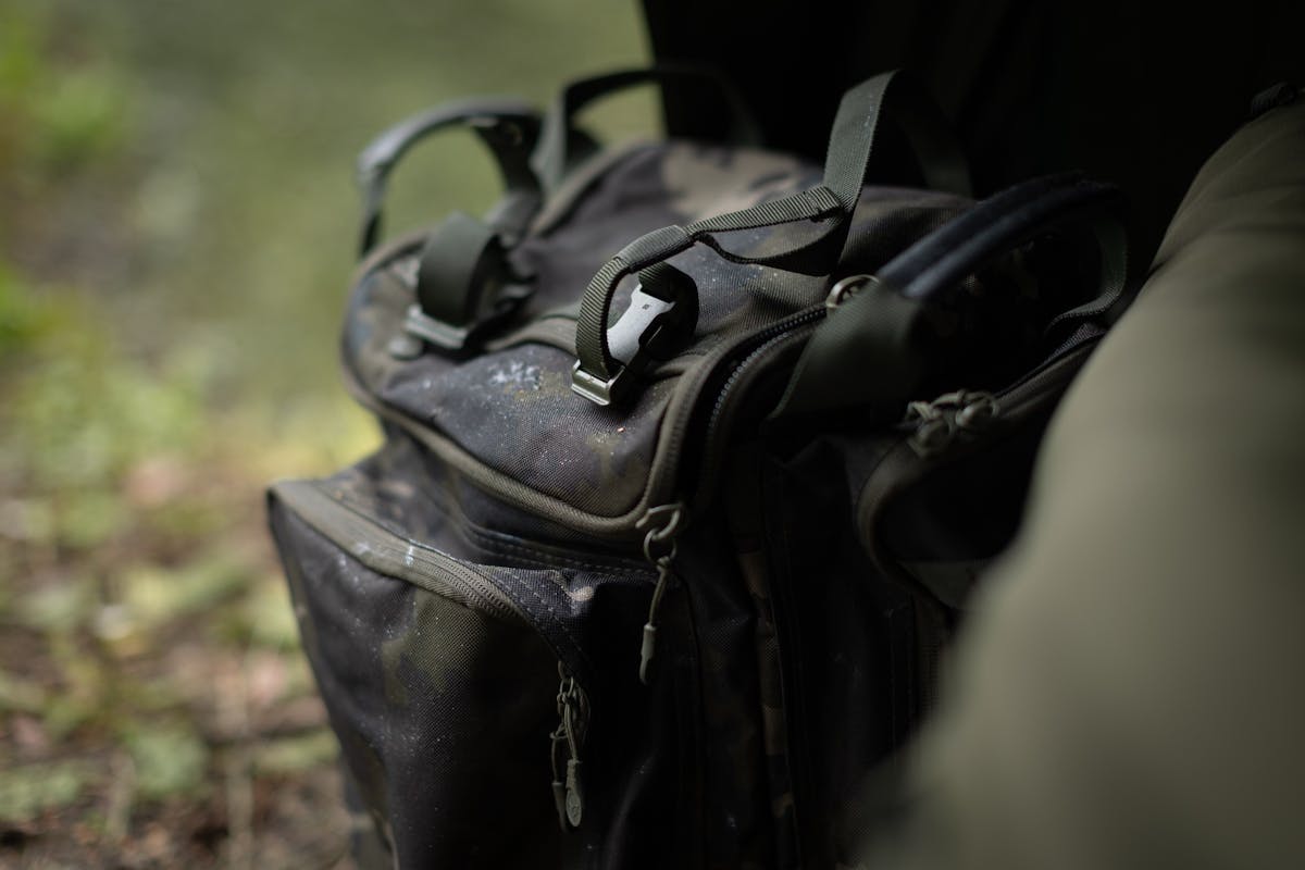 Water resistant fabric and heavy duty zips feature on the Korda Compac Rucksack range