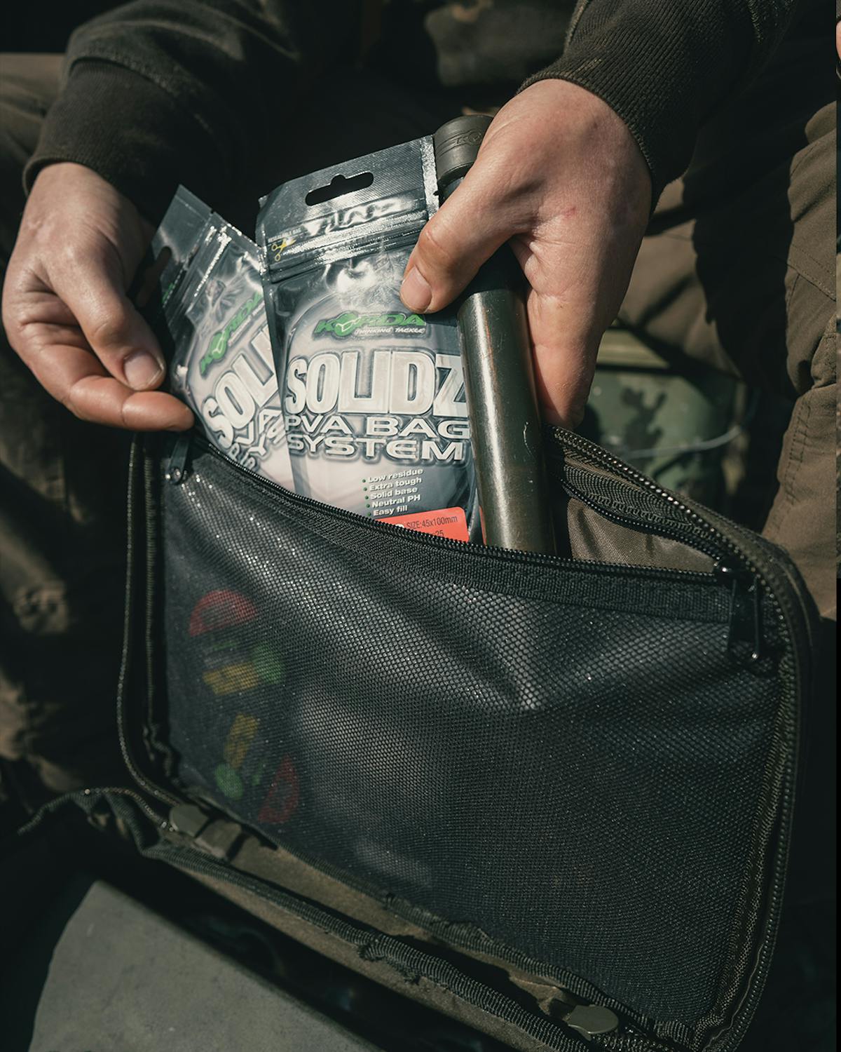 A pocket on the underside of the lid is good for storing things like fishing licences, or even a small tablet device