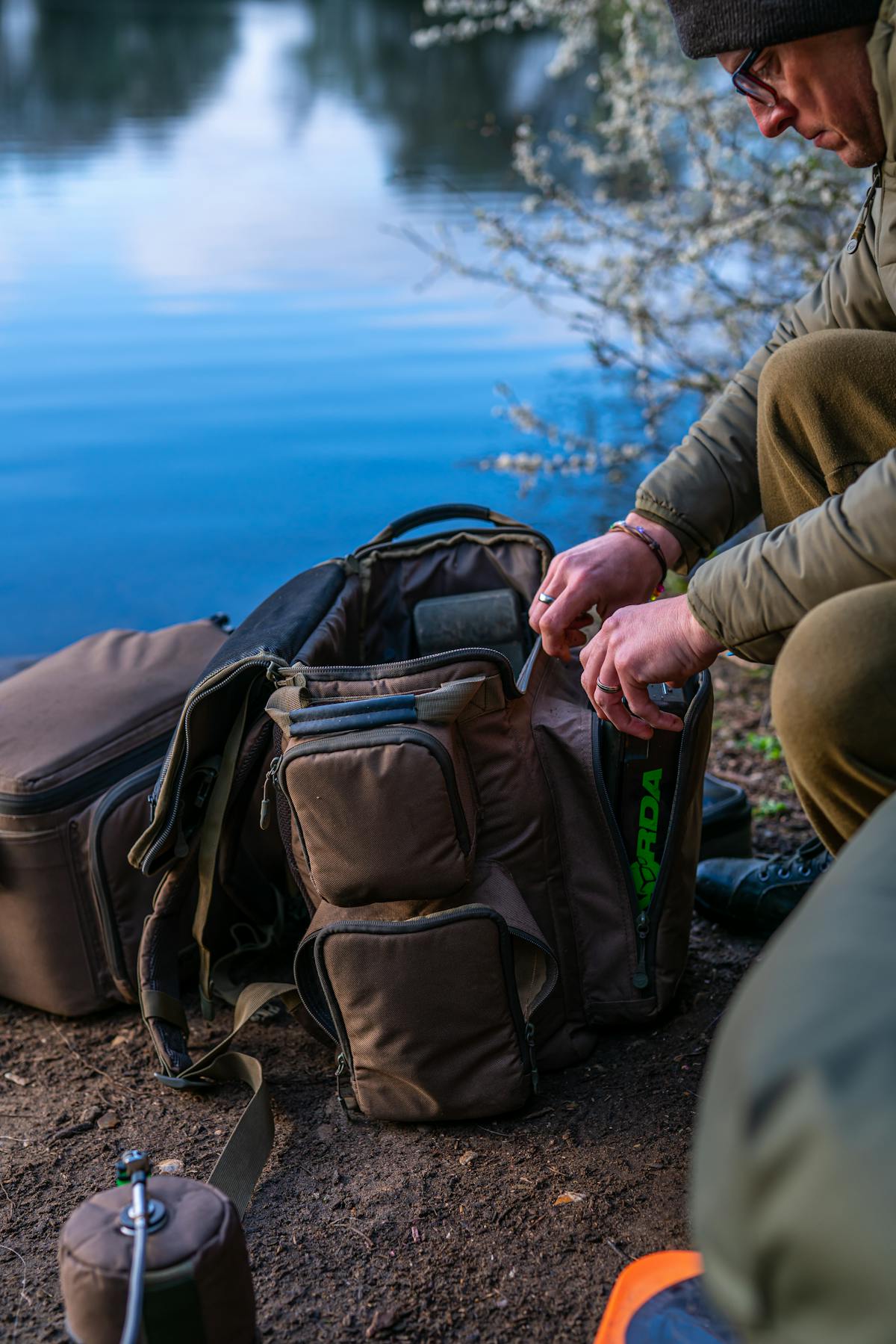 Korda Compac Rucksack 45, 60 or 30 litre versions all have a front pocket for a Korda Tackle Box