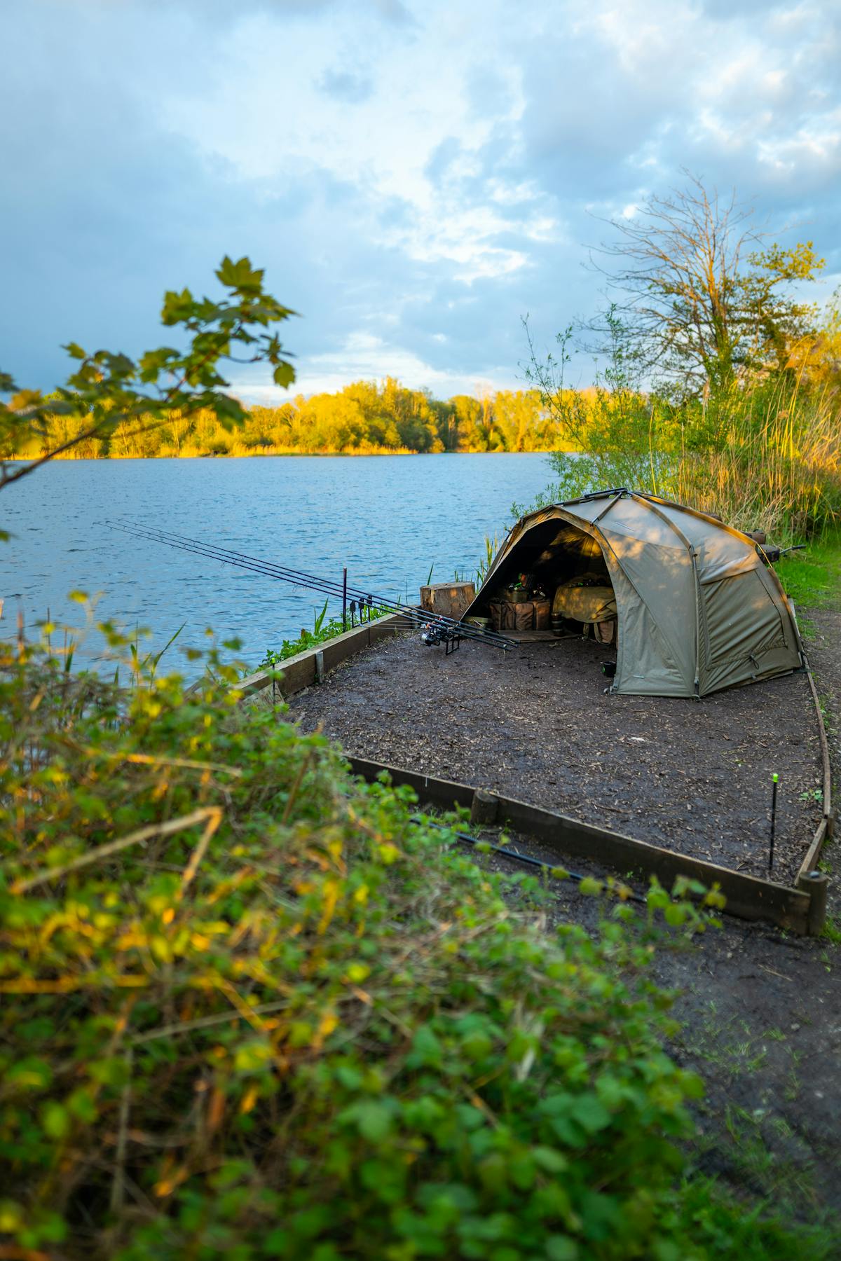 Many waters insist on a proper fishing shelter, not camping tents - your night fishing ticket will usually state the rules