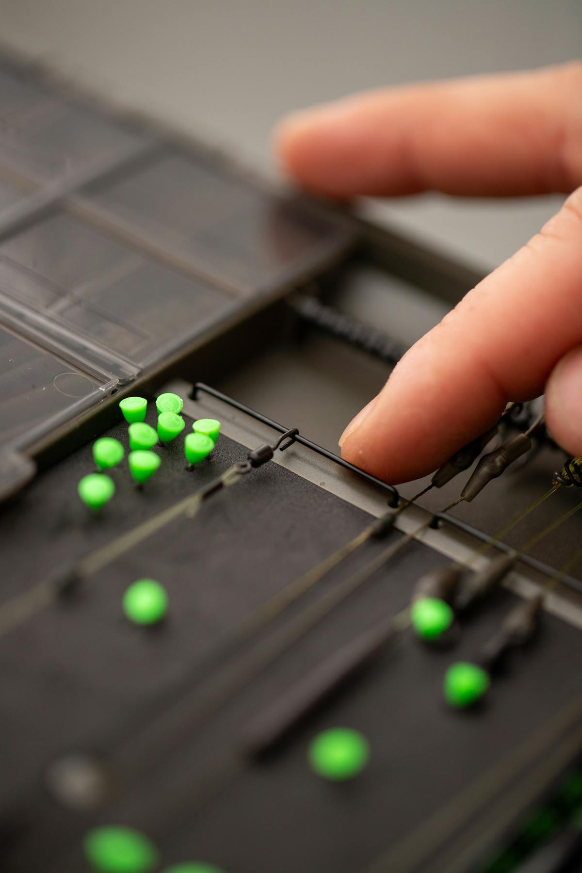 A brand new feature on the Tackle Box Large is a special bar on the rig board, designed to hold spinner swivels