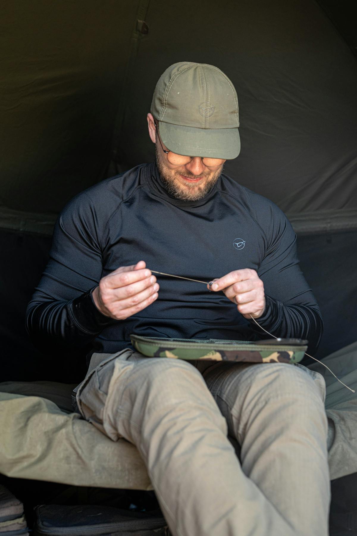 A thermal top, such as this Korda Mock Neck Thermal Long Sleeve Shirt, is ideal as a base layer