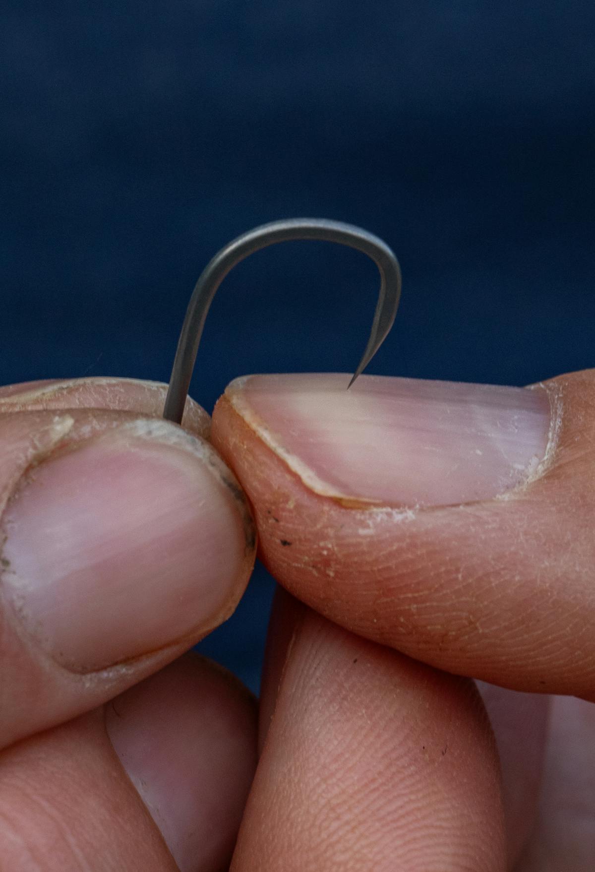 The easiest way to check a hook point is to see if it grips on your nail under light pressure