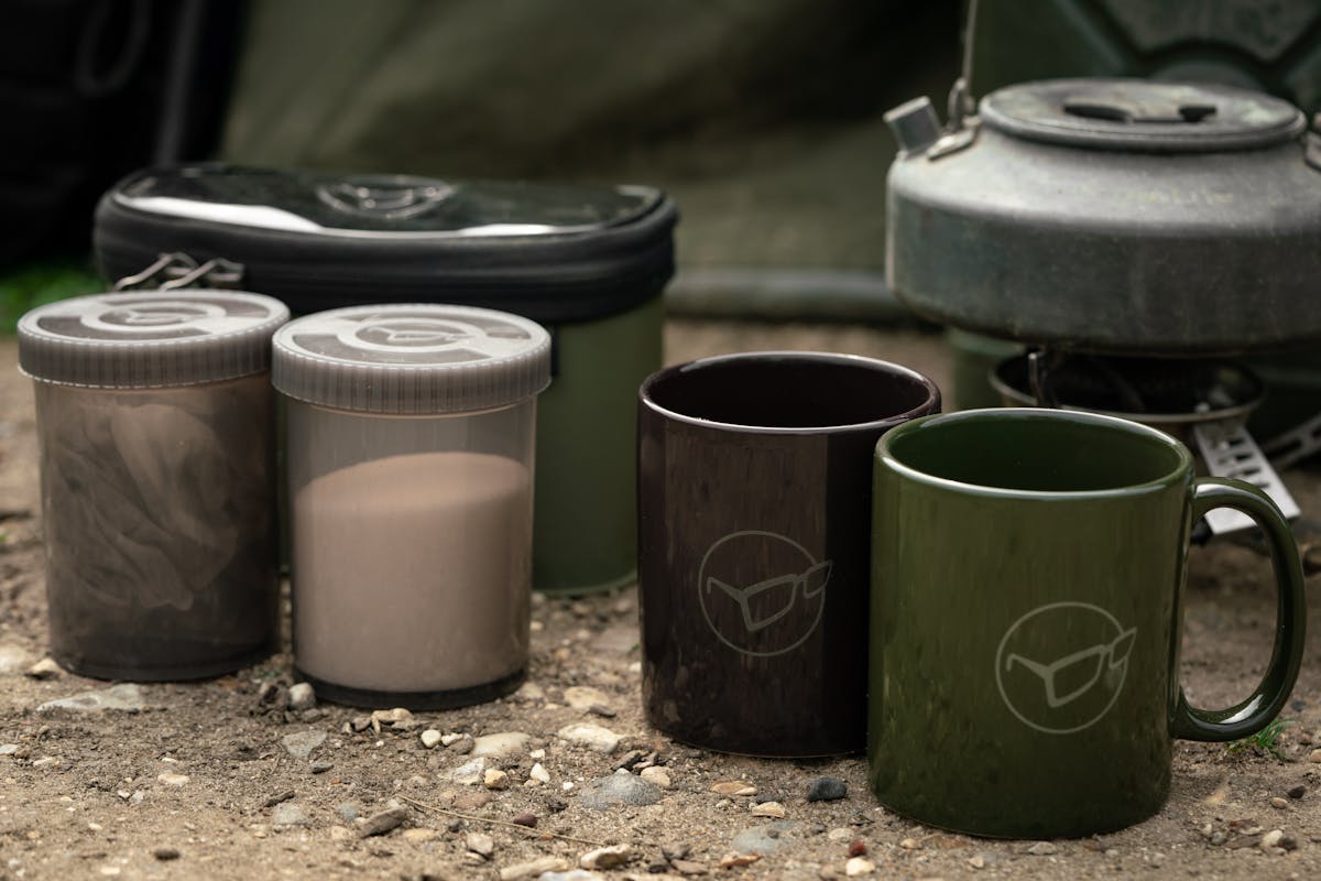The Compac Tea Set includes mugs and screw lid containers
