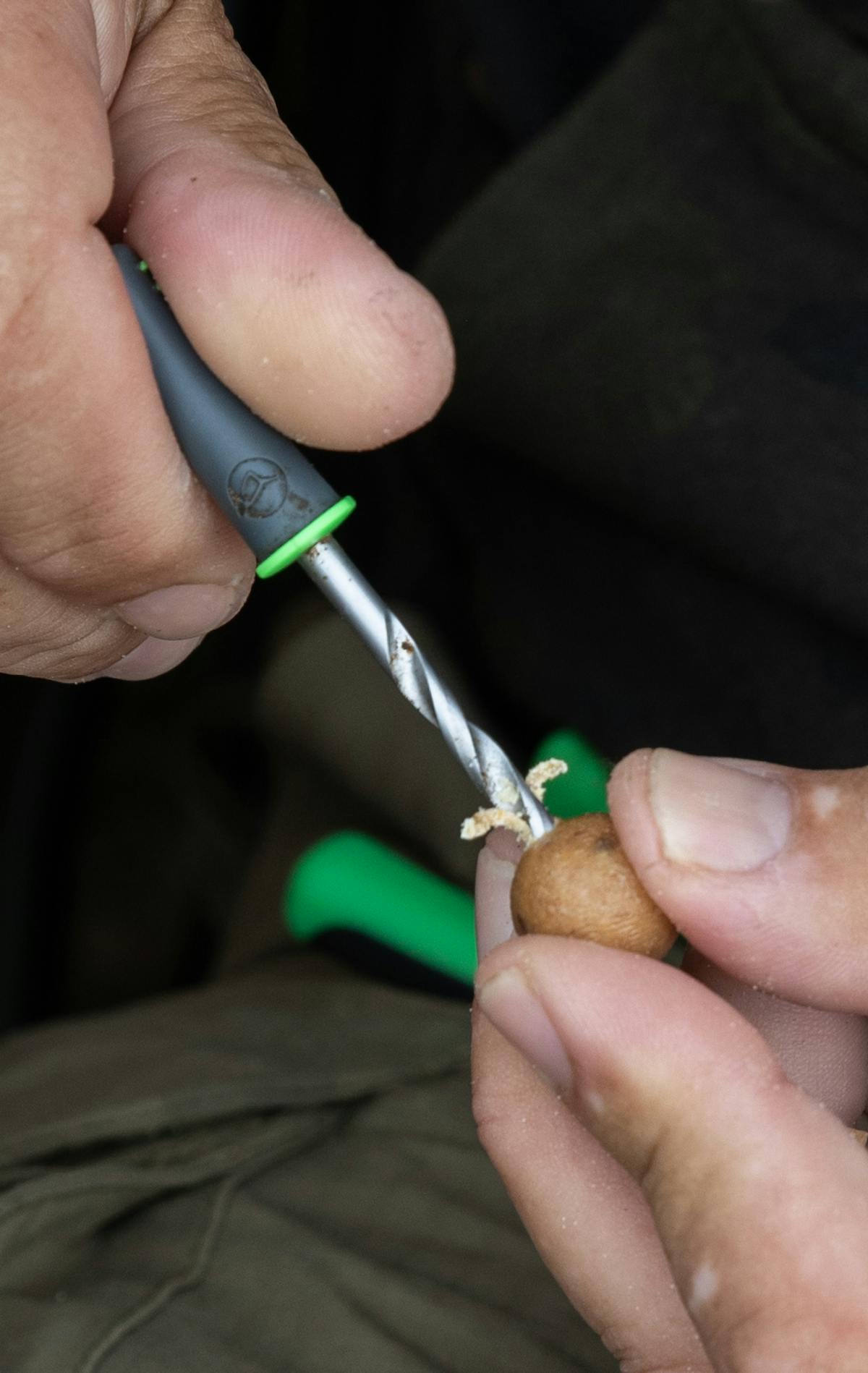 A bottom bait boilie straight out of the bag can be drilled out and plugged with cork to give it some buoyancy, but without making it float