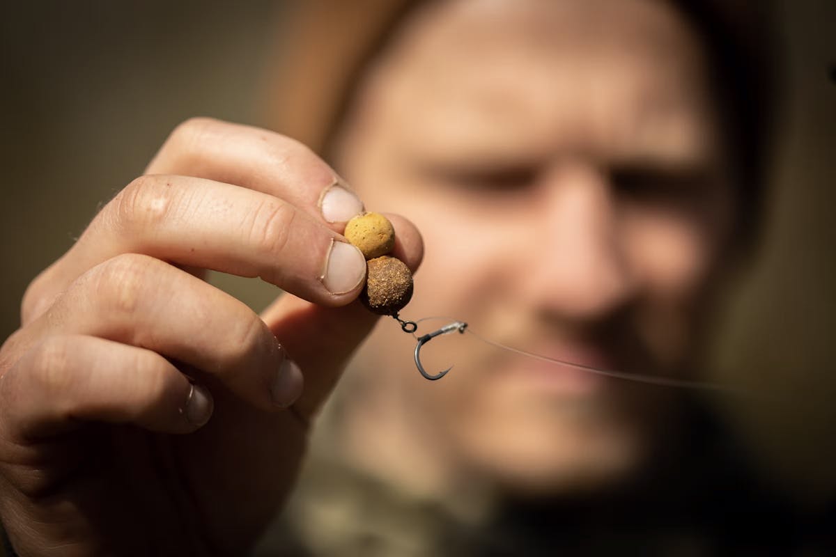 A longer D makes the rig sit differently and offers a better presentation for wafters, a snowman, or a straight bottom bait.
