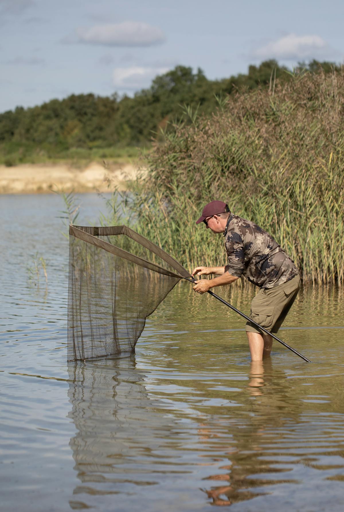 It is vital to secure the fish in your net whilst you ready all the accessories you will need to weigh and photograph it