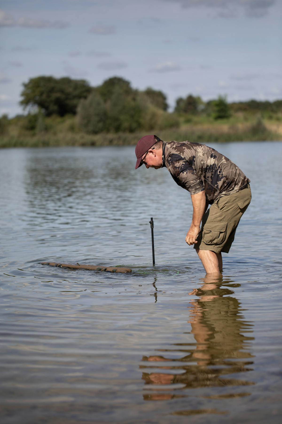 Make sure the water is deep enough and the fish is sitting upright in the sling