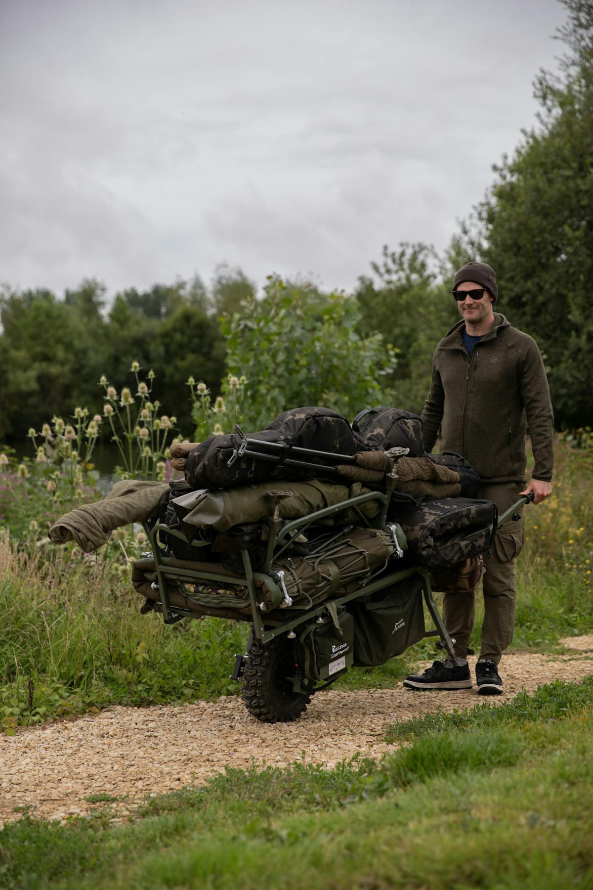 Most carp anglers use some sort of barrow or fishing trolley to transport their fishing tackle around the lake