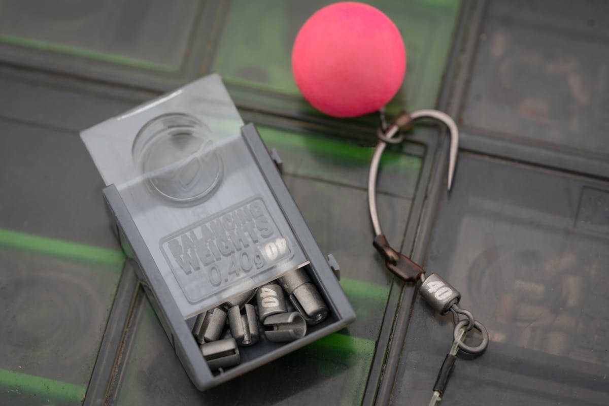 Korda Dark Matter Balancing Weights - sizes vary to help you critically balance hook baits by simply adding one to a size 11 swivel (they won't necessarily fit over types/brand of size 11 swivel)