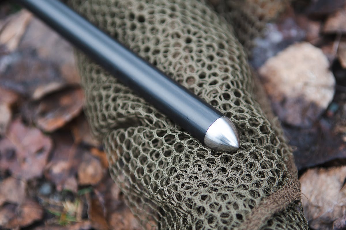 A stainless steel spike on the end of the net pole means that it can be pushed into the ground, keeping the net head well above the surface so the carp can't escape