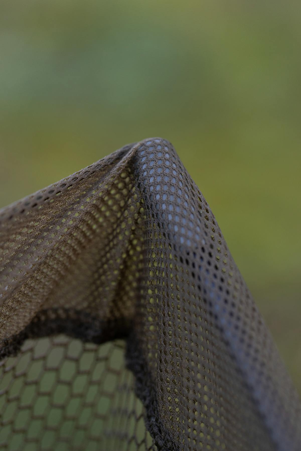 The Korda Hex mesh is strong where the arms thread through it, and the net arms have special end caps on them to prevent them from wearing through the mesh, as well as ensuring that the net cord remains tight