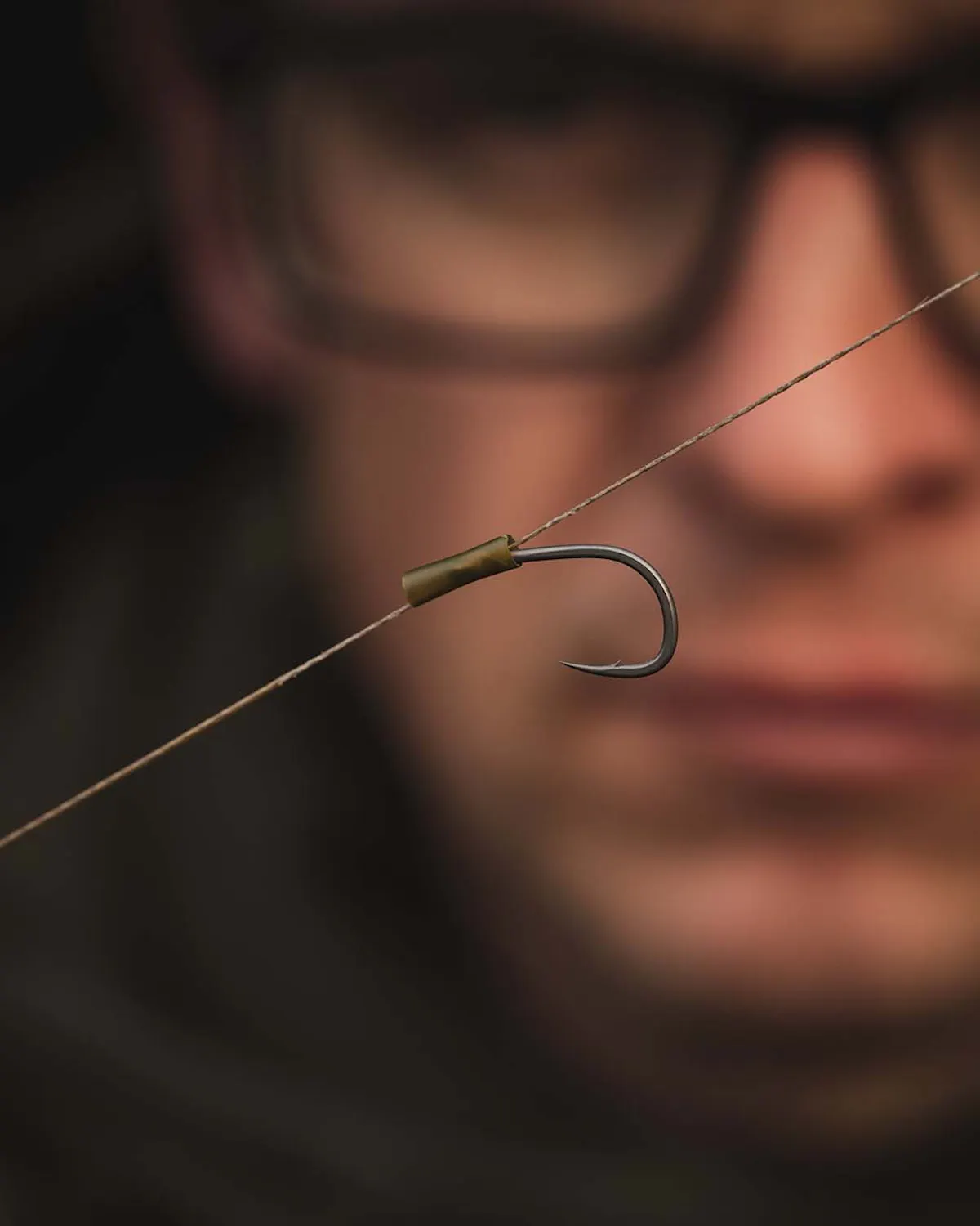 A small piece of shrink tubing over the eye of the hook creates a more aggressive angle and increases the chances of the hook point catching in the bottom lip