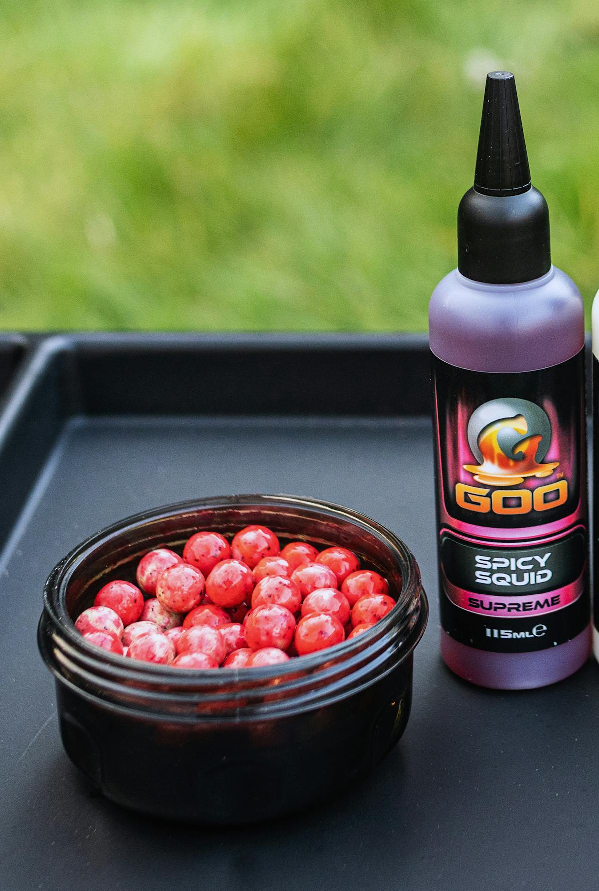 It is easy to create your own pink baits like Elliott Gray does - all you need is a bottle of Spicy Squid Supreme Goo and that is applied directly to your baits