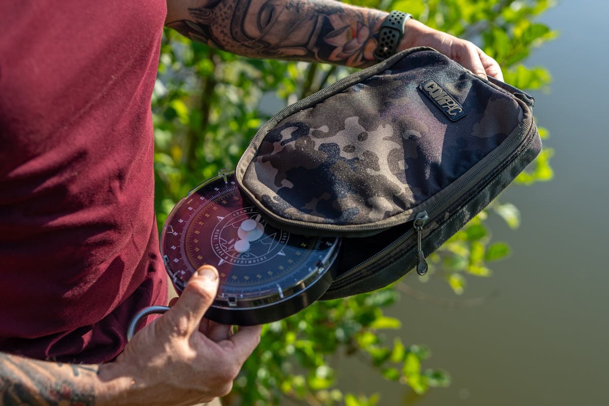 This strong, lightweight, durable and stylish pouch has a padded foam lining to protect your scales and features the Compac logo