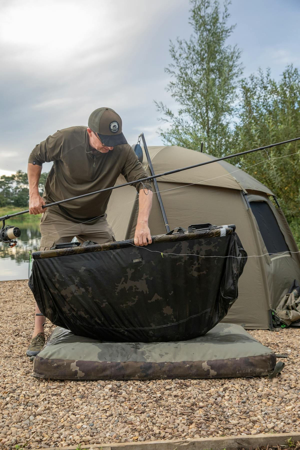 Carefully put the carp on your unhooking mat
