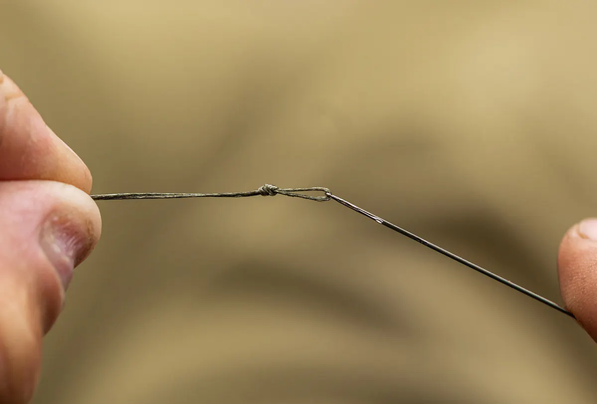 Use a supple braid like Korda Supernatural and tie a loop in it to form your hair