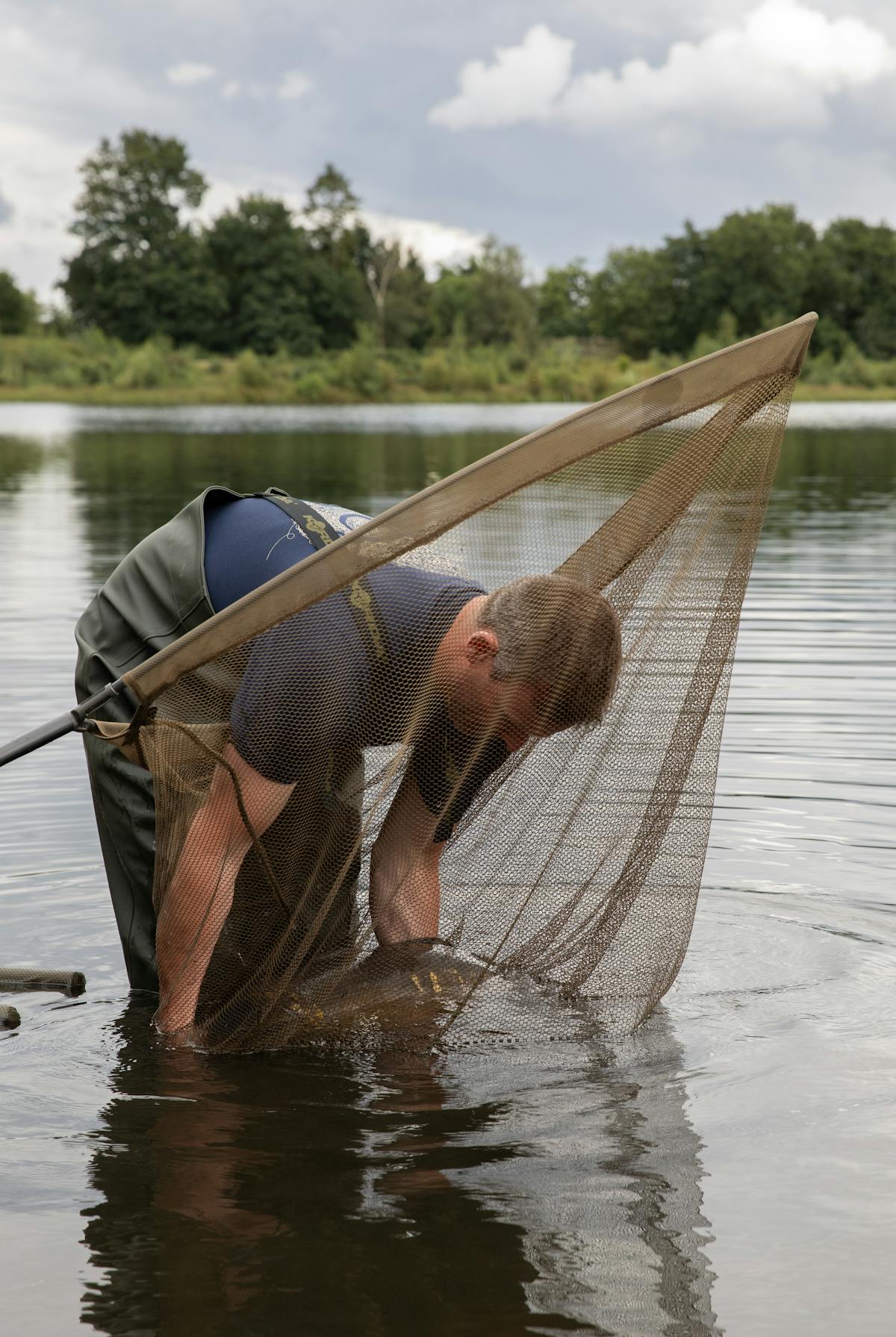 It is better for the well being of the carp if you can unhook it in the net, where possible to do so