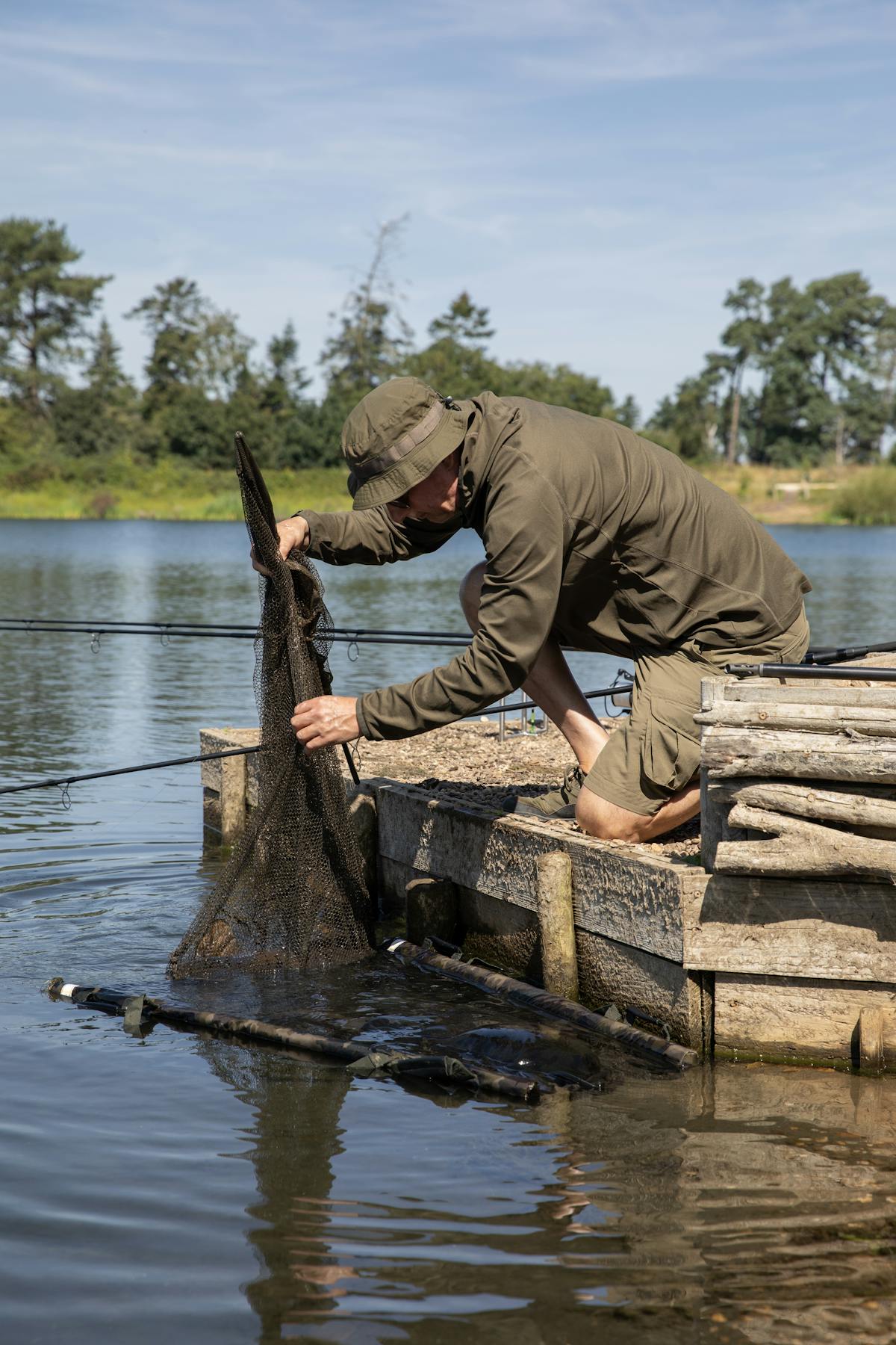 Never lift a fish out in a net as this can split fins or cause cuts, which can then be susceptible to becoming infected